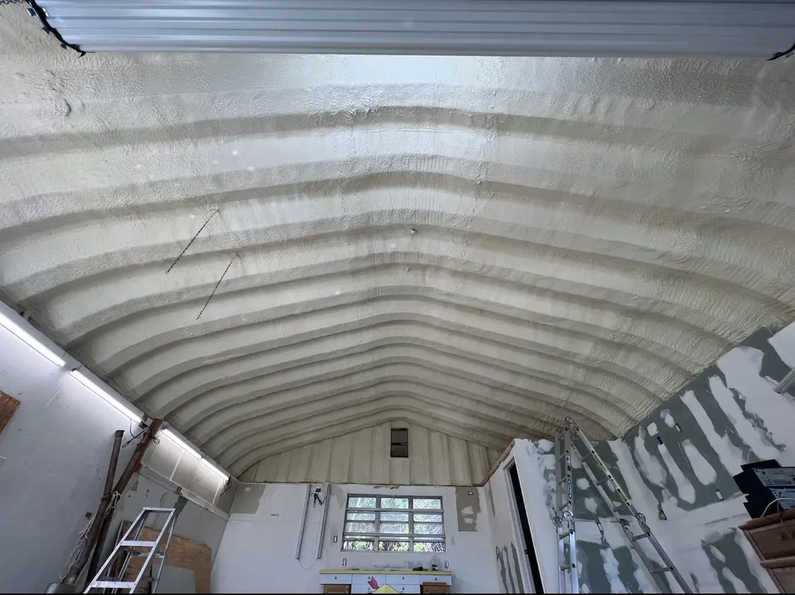 Spray polyurethane foam applied to the underside of a metal roof deck in Homeland Park